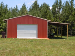 A red metal garage with a garage door.