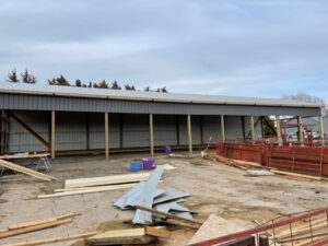 The construction of a barn under construction.
